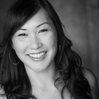 Black and white headshot of Olivia Yu